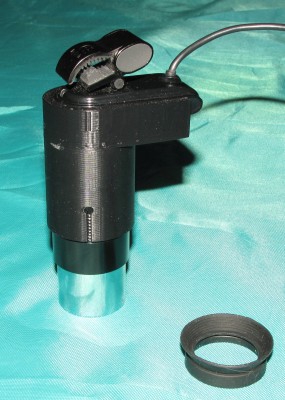 Assembled adapter on the eyepiece.